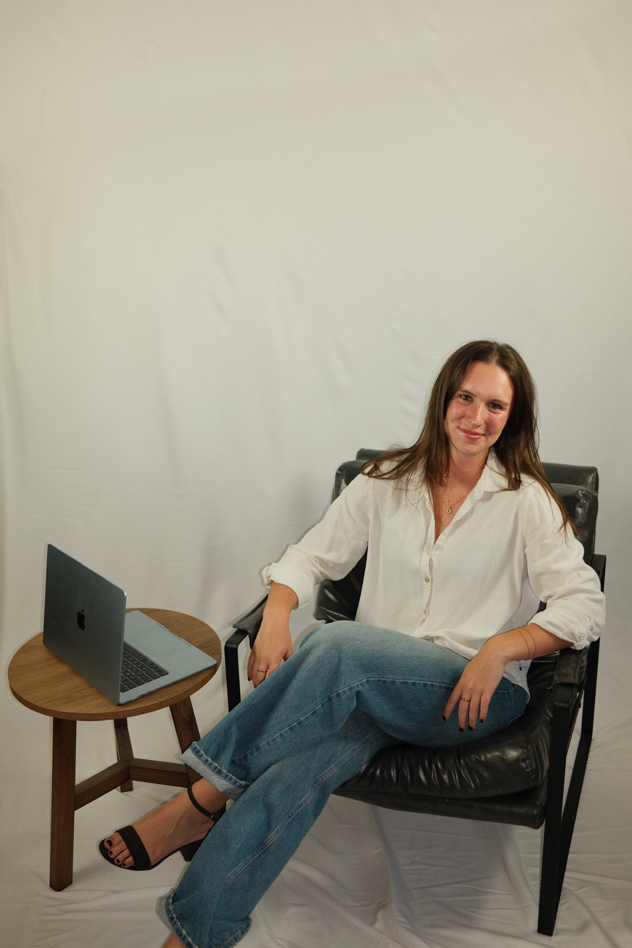 Laetitia Asper working from a studio chair
